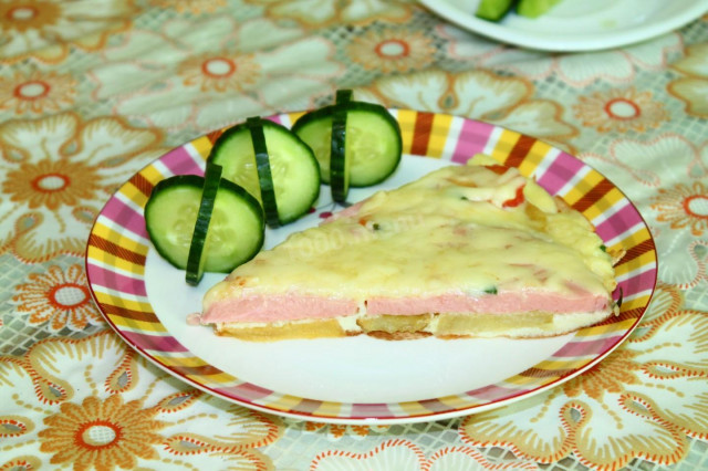 Potato omelet with boiled sausage