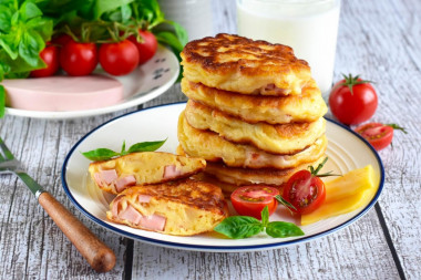 Pancakes on kefir with cheese and sausage