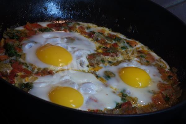 Jewish shakshuka for breakfast with pepper and tomatoes