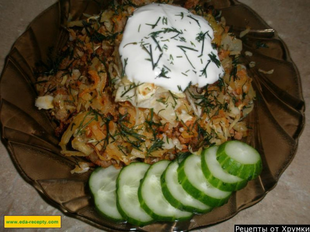 Lazy cabbage rolls in the oven made of pork with tomato and sour cream