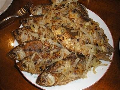 Baked fish on a campfire