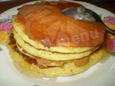 Yeast thick pancakes with butter on kefir