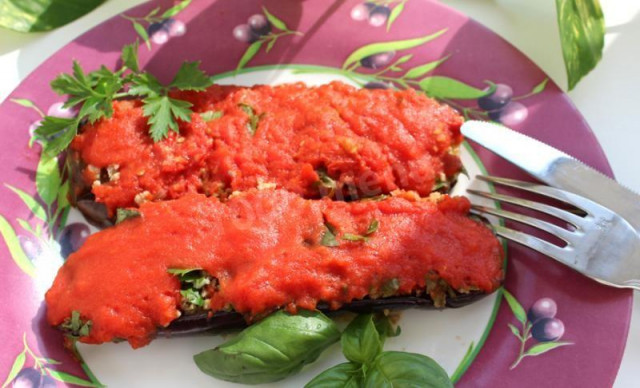 Eggplant with boiled meat in tomato sauce