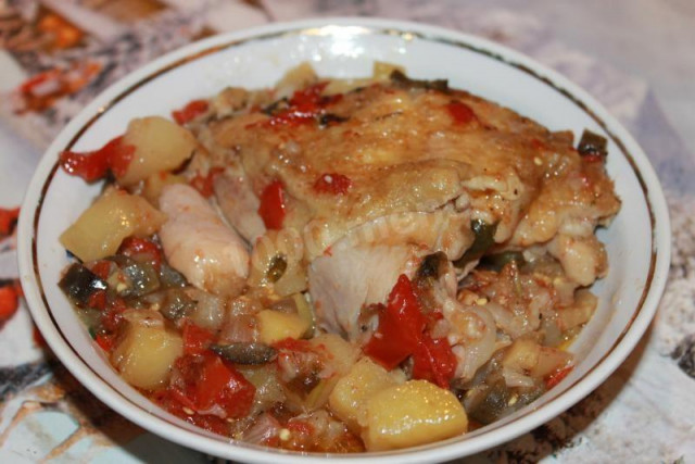 Chicken with tomatoes and eggplant