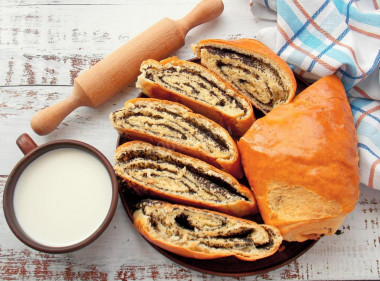 Roll with poppy seeds from yeast dough