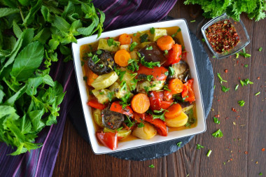 Stewed vegetables in a cauldron on the stove