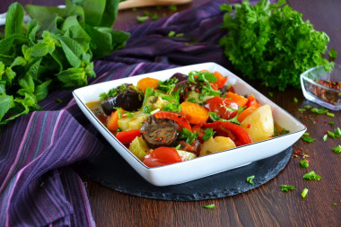 Stewed vegetables in a cauldron on the stove