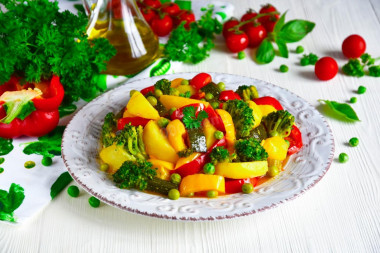 Stewed potatoes with vegetables in a frying pan