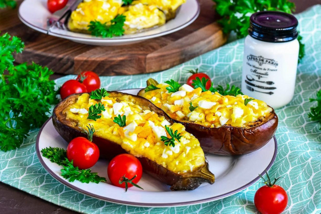 Eggplant baked with cheese and garlic in the oven