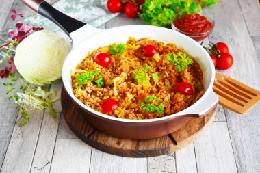 Buckwheat with cabbage stewed in a pan