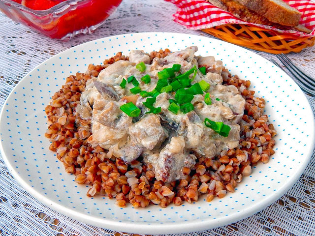 Turkey in sour cream sauce in a frying pan