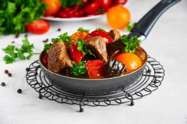 Beef with eggplant stewed tomatoes and peppers