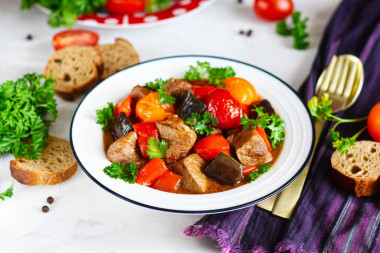 Beef with eggplant stewed tomatoes and peppers