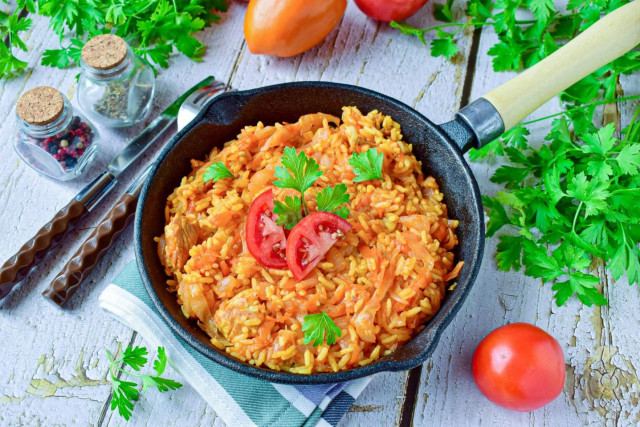 Cabbage with rice and meat stewed in a frying pan