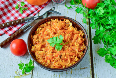 Cabbage with rice and meat stewed in a frying pan