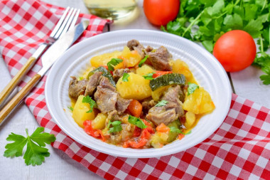 Lamb with vegetables in a cauldron stewed