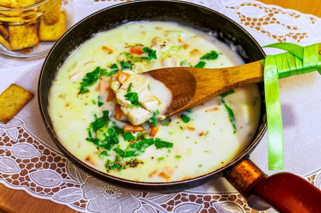 Breast stewed in sour cream in a frying pan