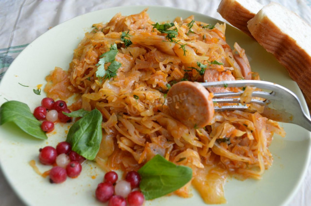 Stewed cabbage with sausages in a slow cooker