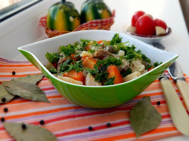 Stewed meat with vegetables in a slow cooker