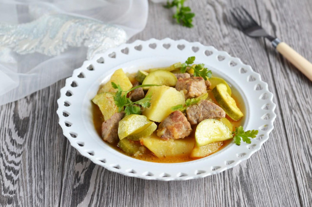 Stewed zucchini with meat and potatoes