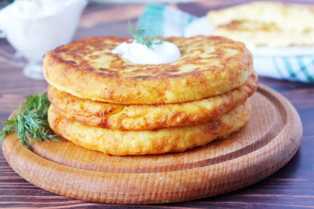 Potato tortillas in a frying pan