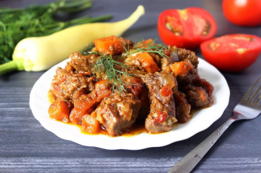 Beef stewed with vegetables in a slow cooker