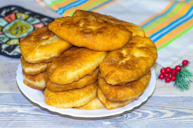 Yeast pies on water in a frying pan