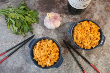 Stewed rice with minced turmeric, carrots and onions