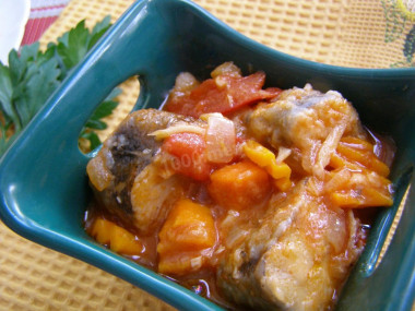 Stewed hake with celery and tomatoes