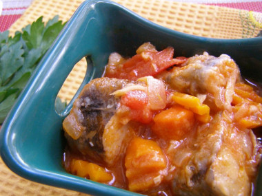 Stewed hake with celery and tomatoes