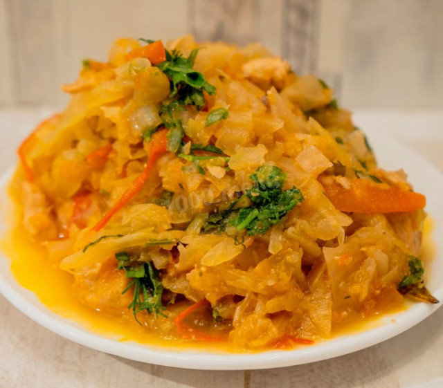 Fresh stewed cabbage with turkey fillet and tomatoes