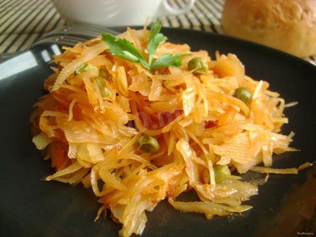 Stewed cabbage with green peas in a slow cooker