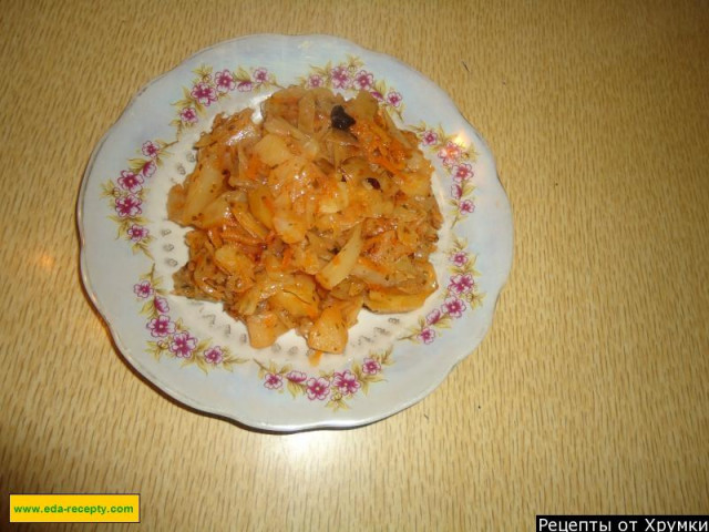 Stewed cabbage with potatoes and carrots