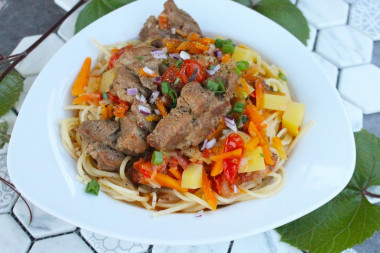 Lagman on a campfire in a cauldron