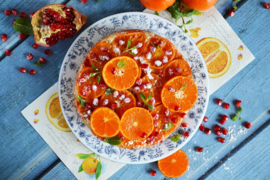 Pie with tangerines in the oven