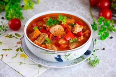 Pork goulash with gravy in a slow cooker