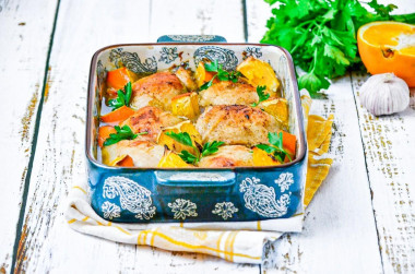 Chicken with oranges in the oven