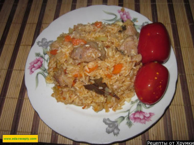 Pilaf in the oven with crumbly pork