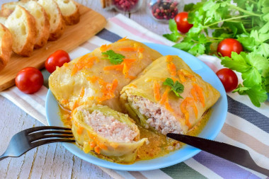 Frozen cabbage rolls in a frying pan