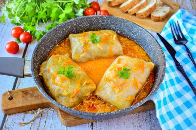 Frozen cabbage rolls in a frying pan