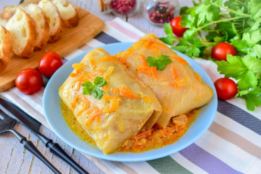 Frozen cabbage rolls in a frying pan