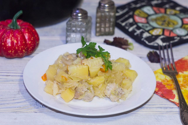 Potatoes with cabbage and meat in a slow cooker