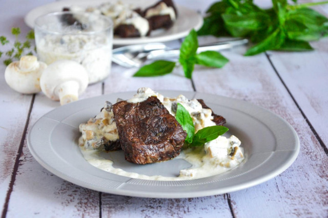 Beef pieces in the oven are juicy and soft