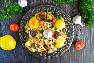 Pilaf with quince and meat in Uzbek style