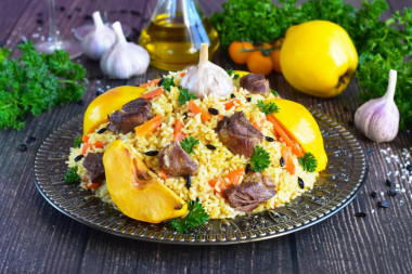 Pilaf with quince and meat in Uzbek style