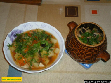 Eggplant in pots in the oven with vegetables