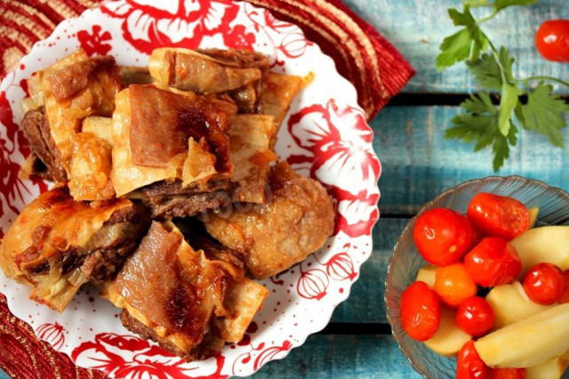 Beef ribs in a slow cooker