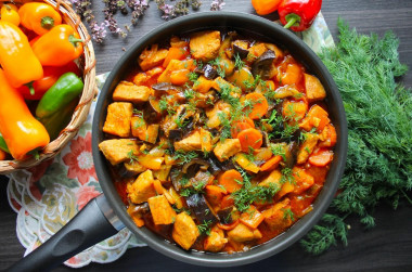 Pork with eggplant in a frying pan