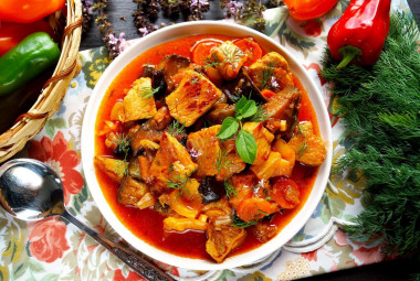 Pork with eggplant in a frying pan