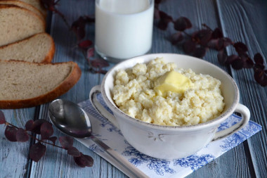 Millet porridge in a saucepan on milk